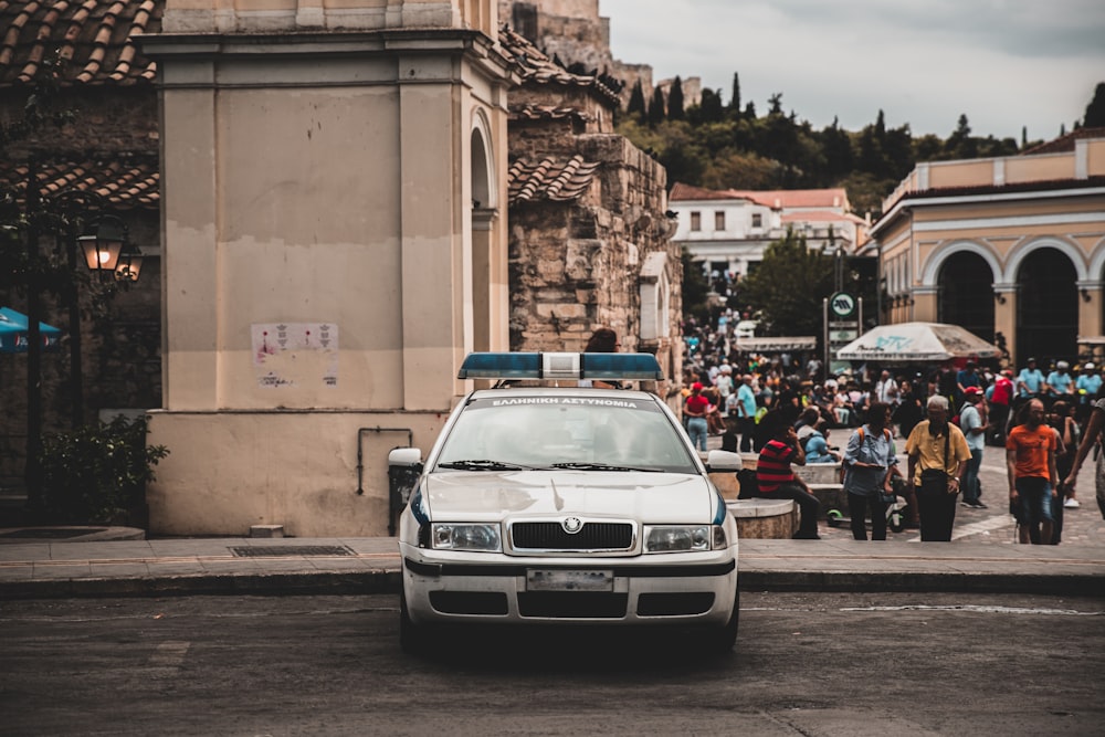 white police car on street