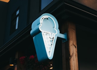 blue and white ice cream cone signage