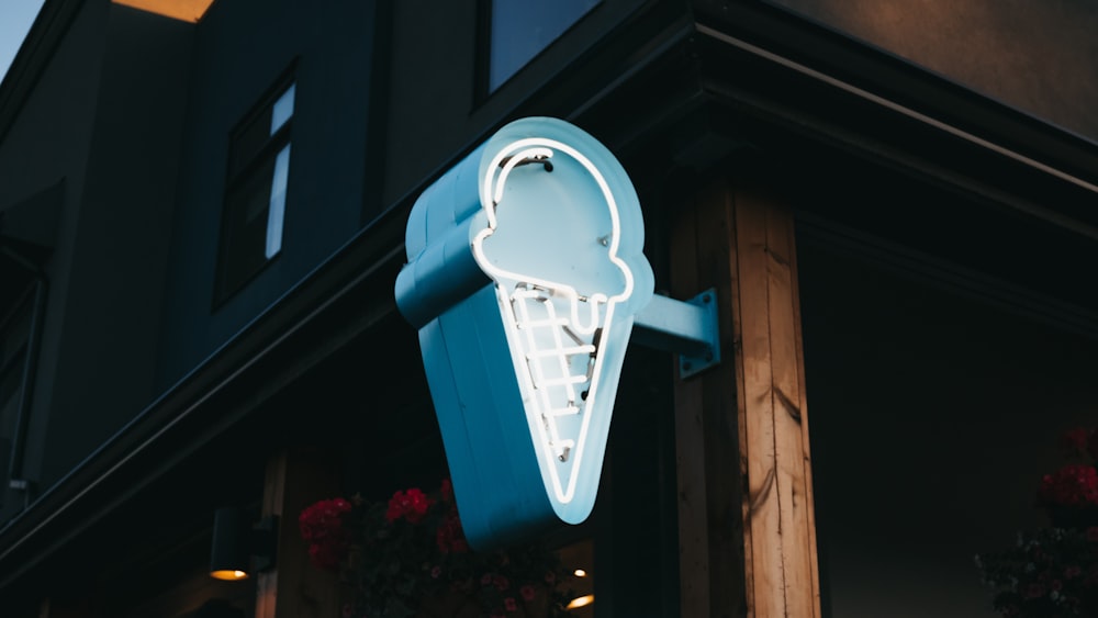 blue and white ice cream cone signage