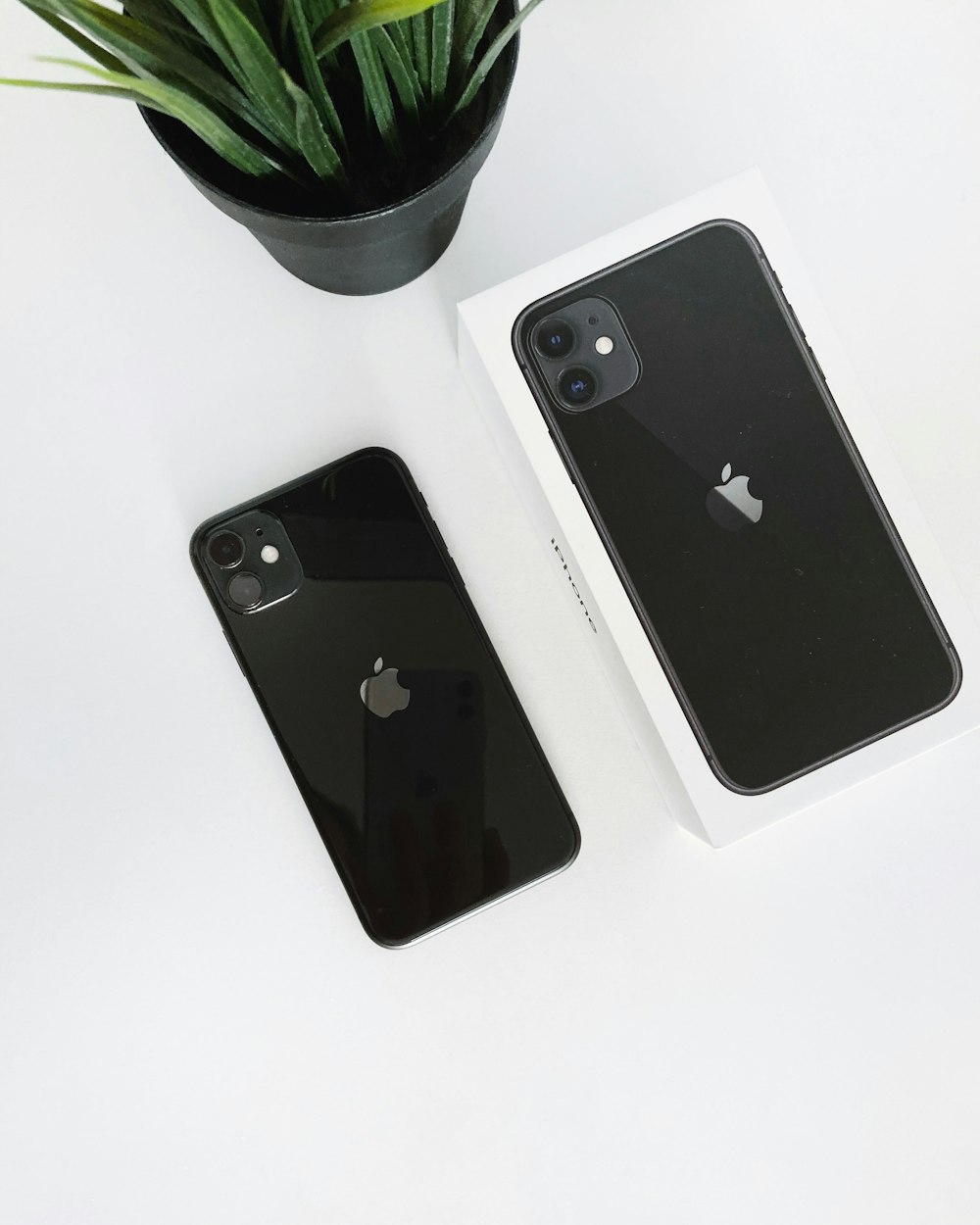 black iPhone 11 with box