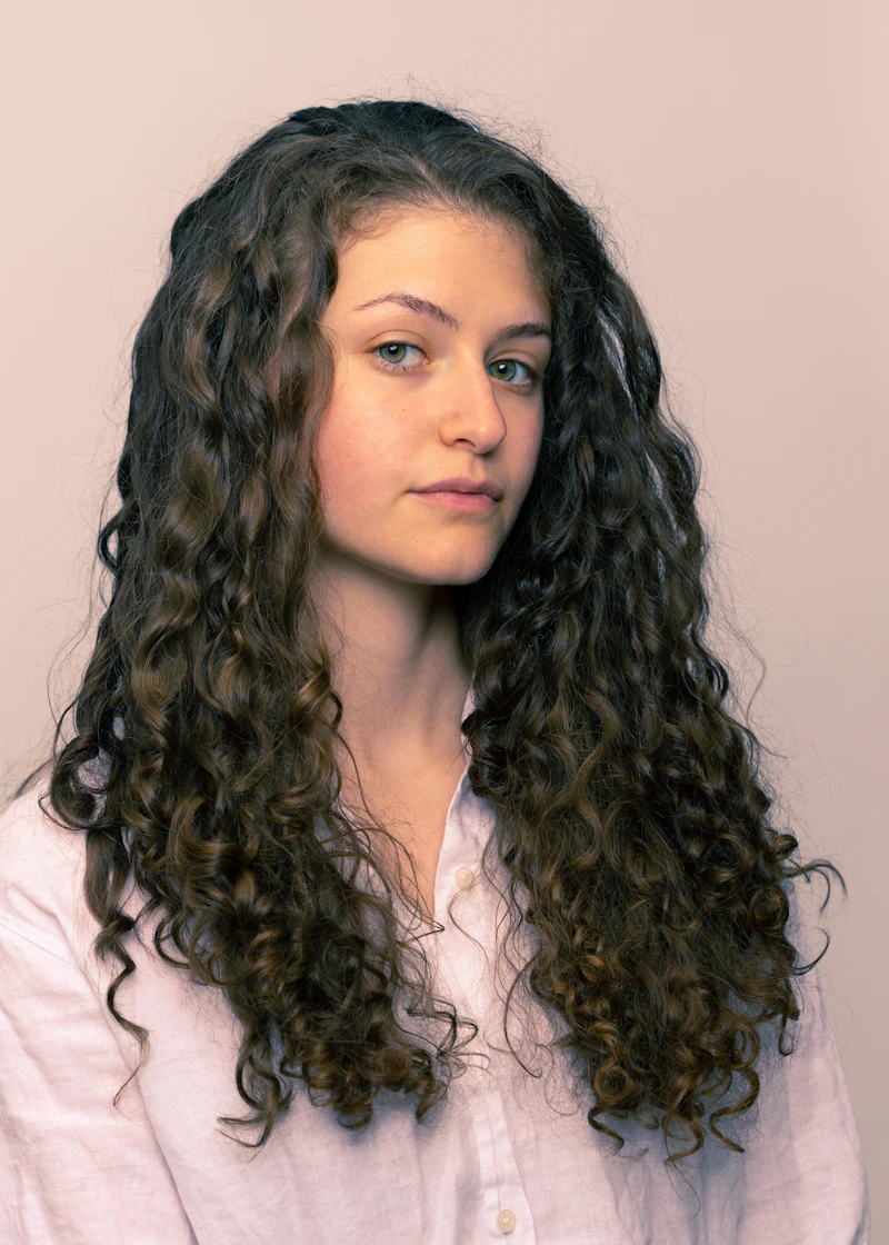 Defined bouncy curls after professional curl cut
