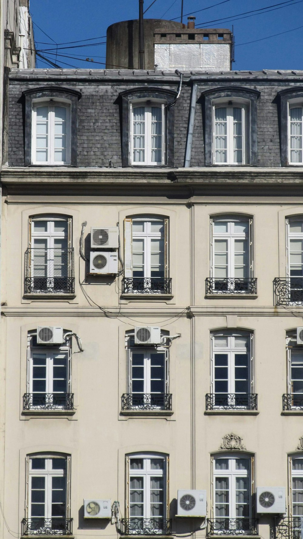 white and gray building during day