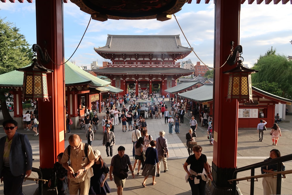 people standing front of temple at daytime