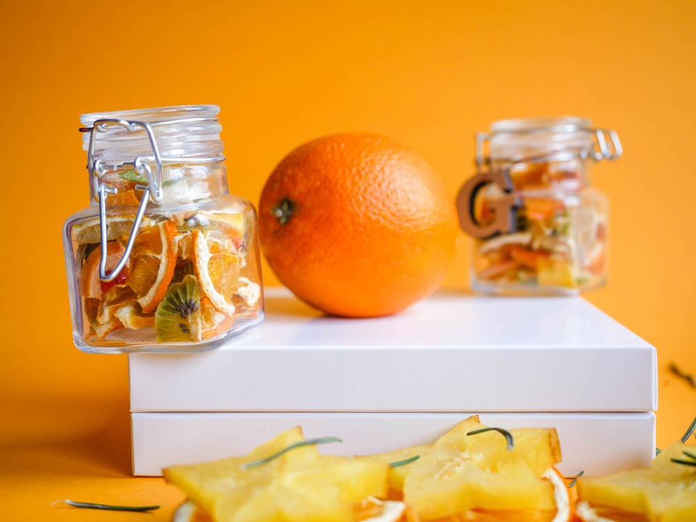 orange fruit on white box