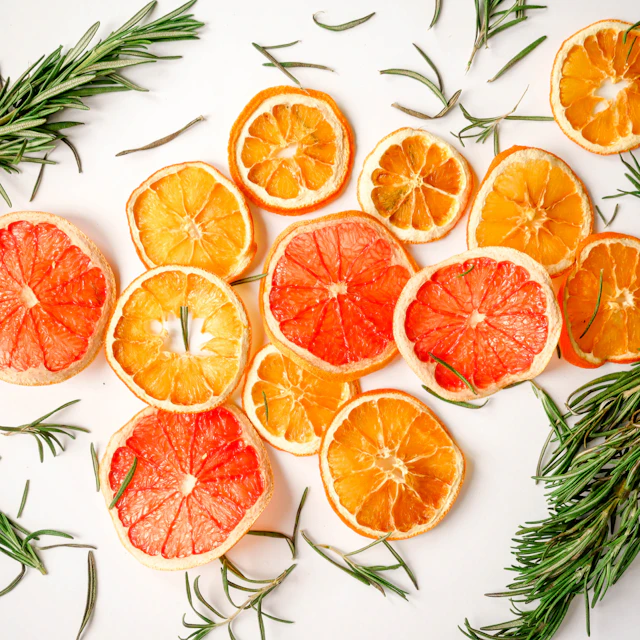 Sliced oranges showing their bright segments on a table