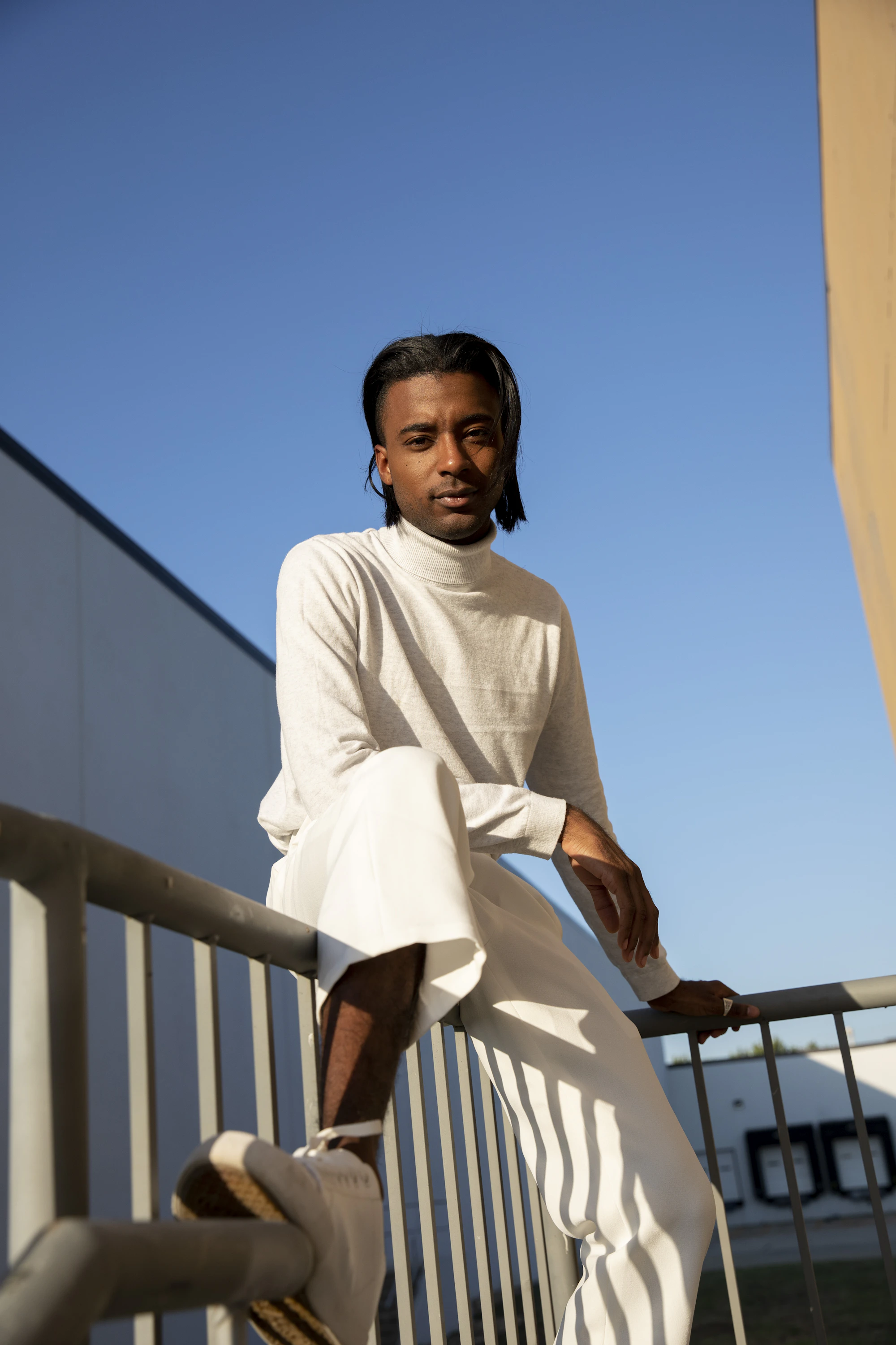 A man sitting on a terrace