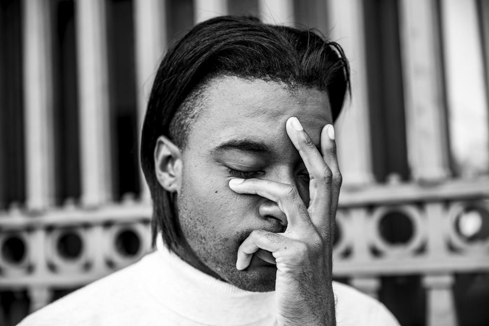 grayscale photo of man wearing shirt