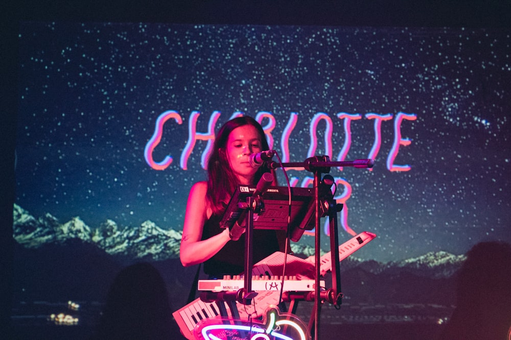 woman holding keytar