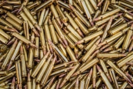 Stacked finished brass components ready for quality check and packaging at Ryzen Metals.