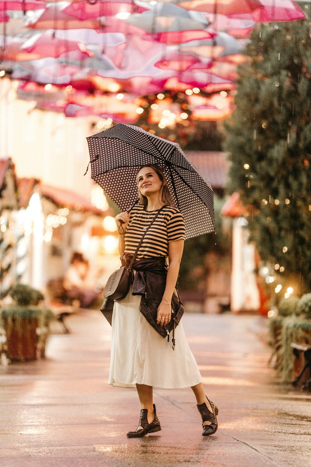 woman under grey umbrella