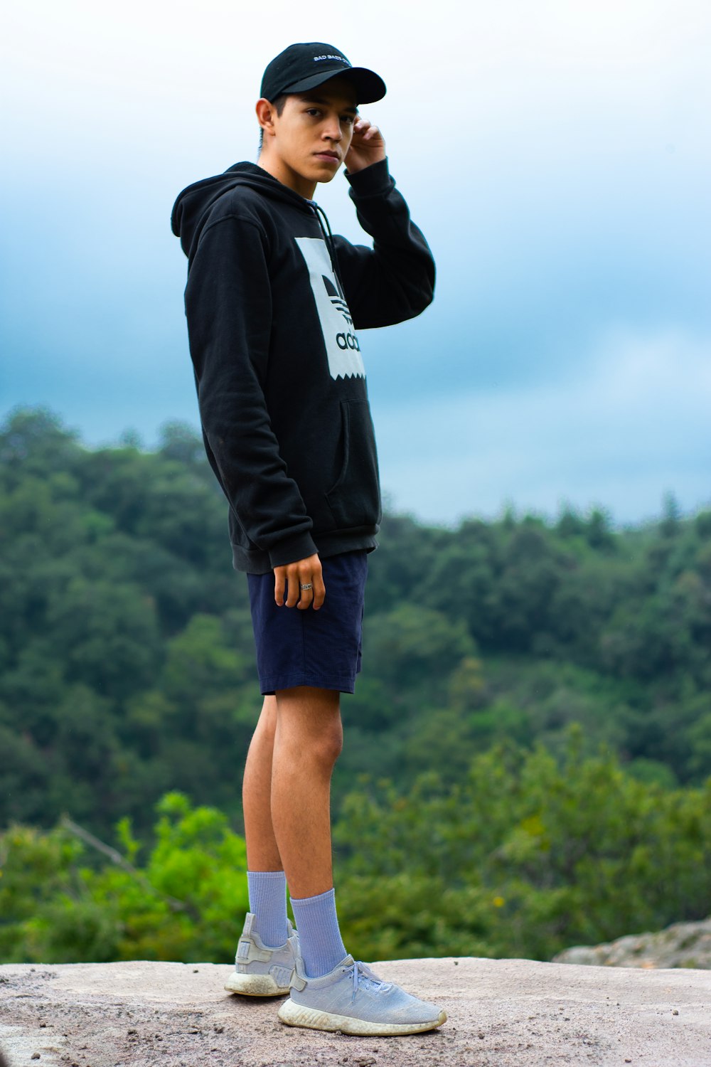 man standing on rock