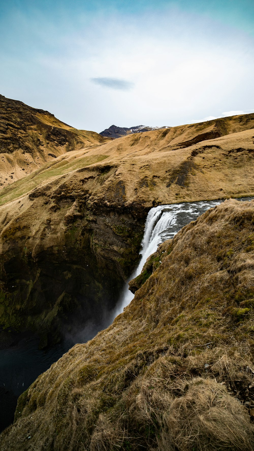 waterfall during daytime