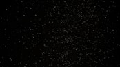 a black sky with a lot of stars