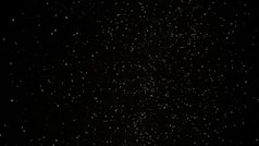a black sky with a lot of stars