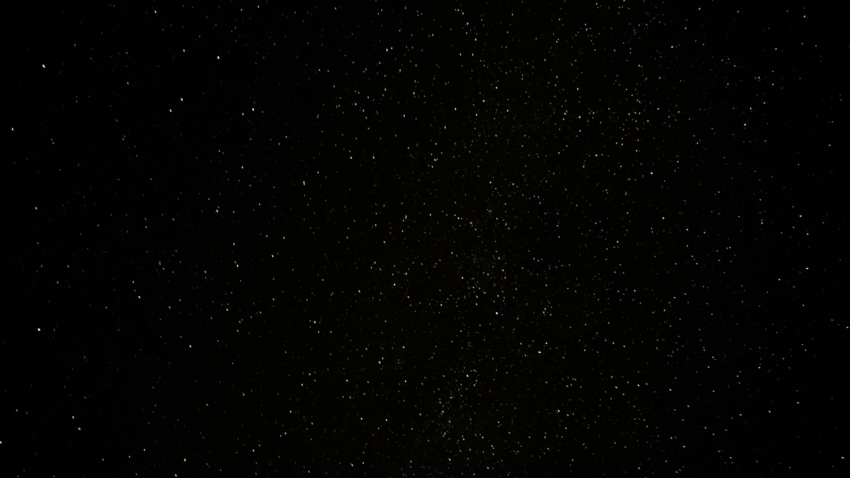 a black sky with a lot of stars