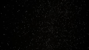 a black sky with a lot of stars