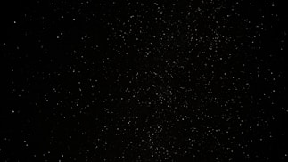 a black sky with a lot of stars