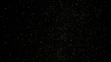 a black sky with a lot of stars