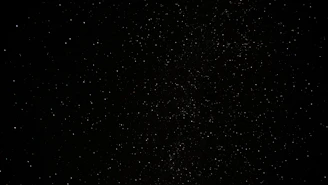 a black sky with a lot of stars