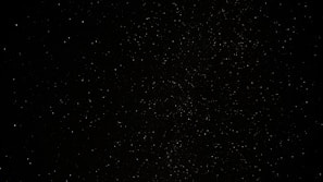 a black sky with a lot of stars