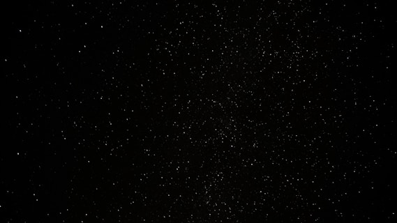 a black sky with a lot of stars