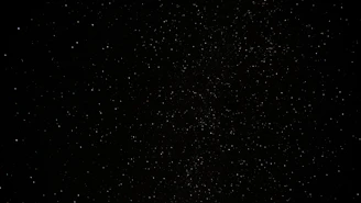 a black sky with a lot of stars