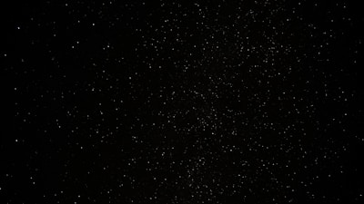 a black sky with a lot of stars
