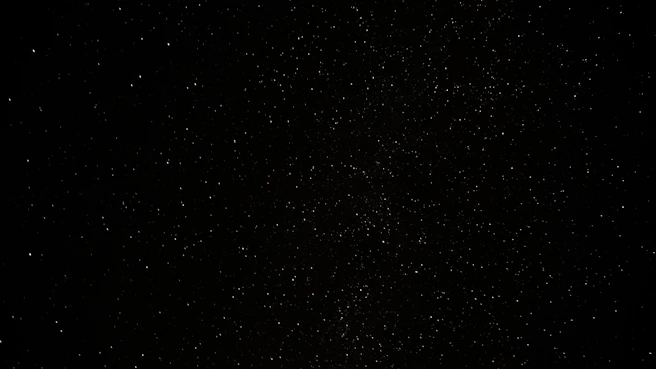 a black sky with a lot of stars