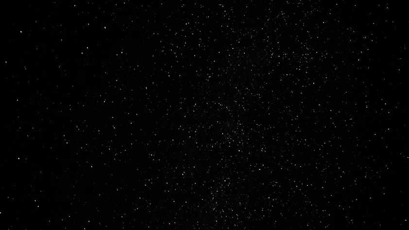 a black sky with a lot of stars