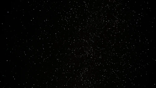 a black sky with a lot of stars