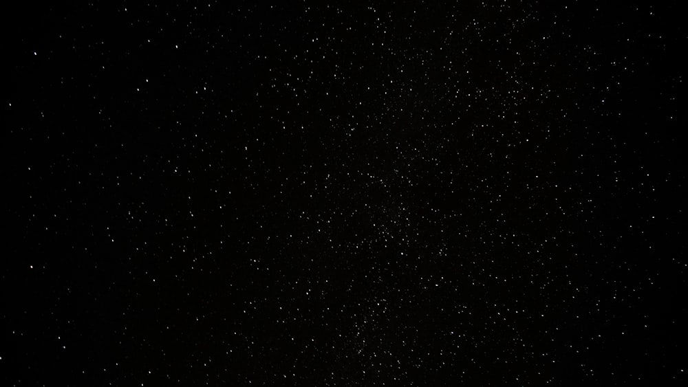 a black sky with a lot of stars