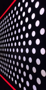 High-contrast image of a structured grid layout with visible dividers and sharp rectangular containers.