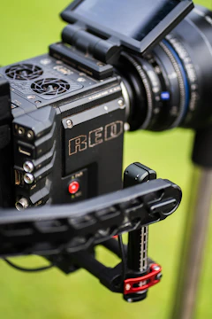 Close-up of a filmmaker reviewing footage on a high-resolution monitor.