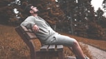 man sitting in bench-subtitle-Principle of Rest and Recovery-title-How to Get Lean Mass Body