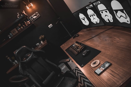 A sleek home office setup featuring a newly upgraded desktop with ambient dark mode lighting.