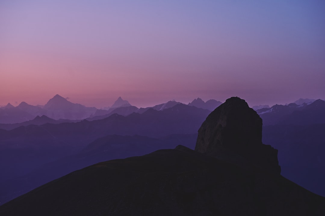 silhouette of mountain during golden hour,