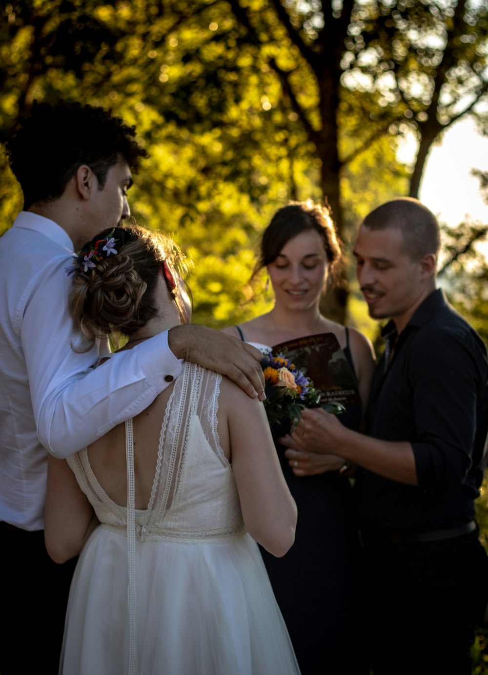 pair of couples having conversation