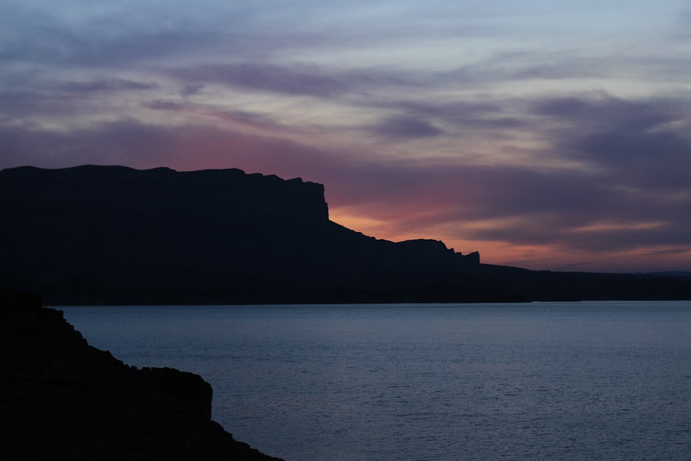 cliffs and body of water