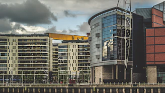 a large building with a crane on top of it