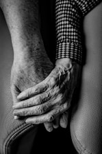 grayscale photography of human hands