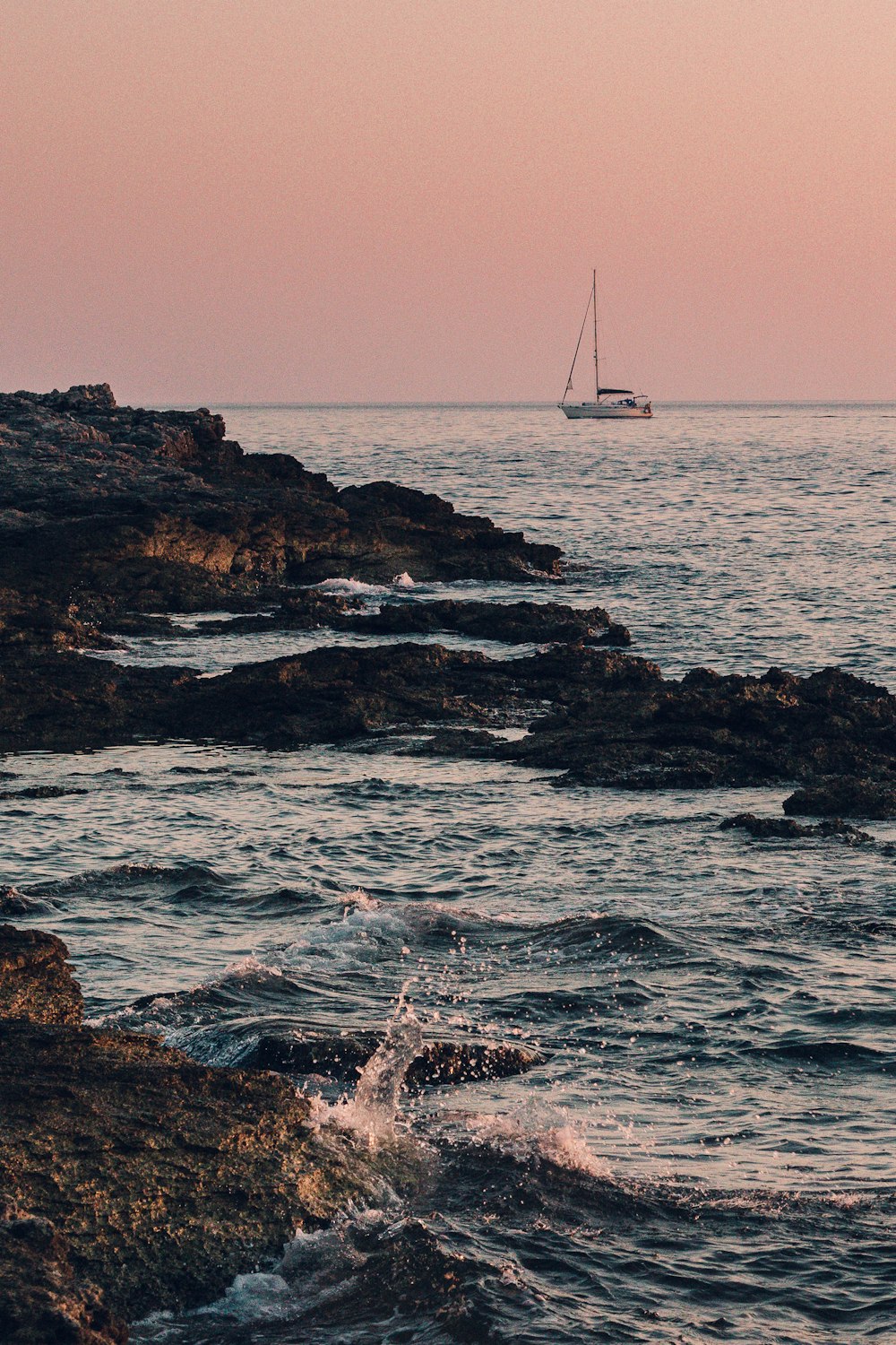 boat on body of water during golden hour