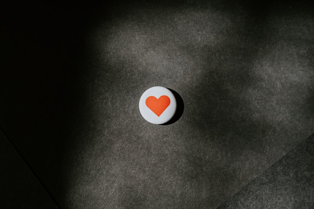 round white and red heart button-pin