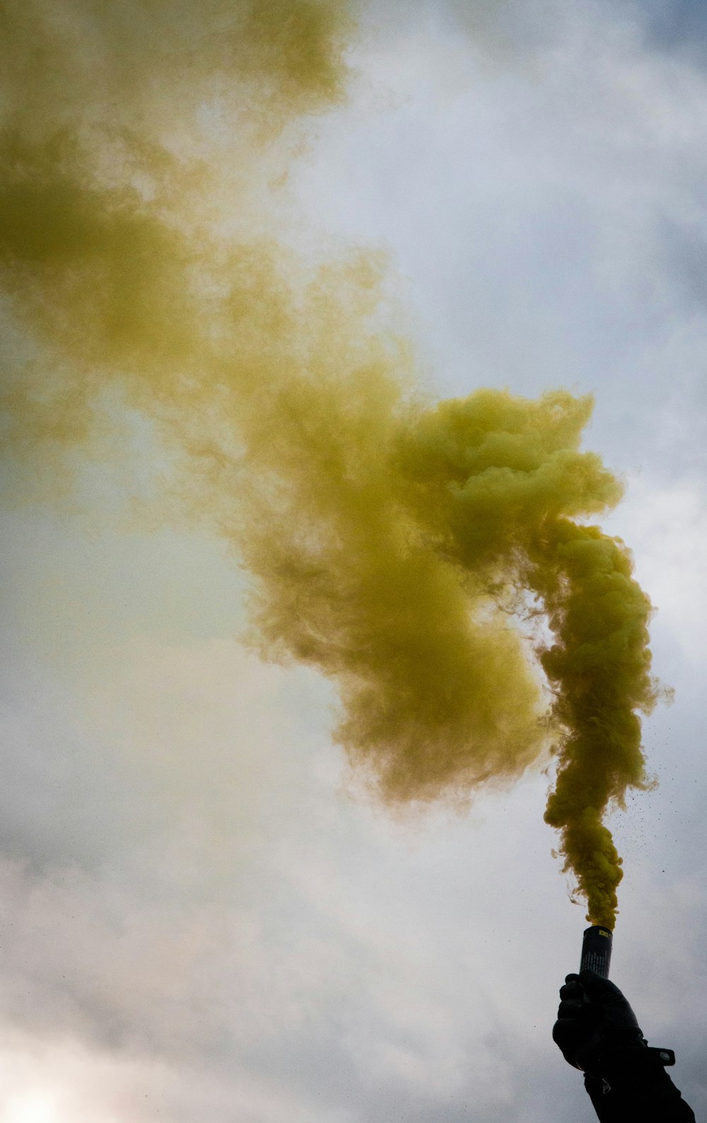 green smoke during daytime