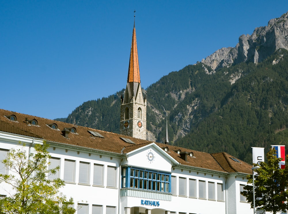 view of white and brown concrete building during daytime