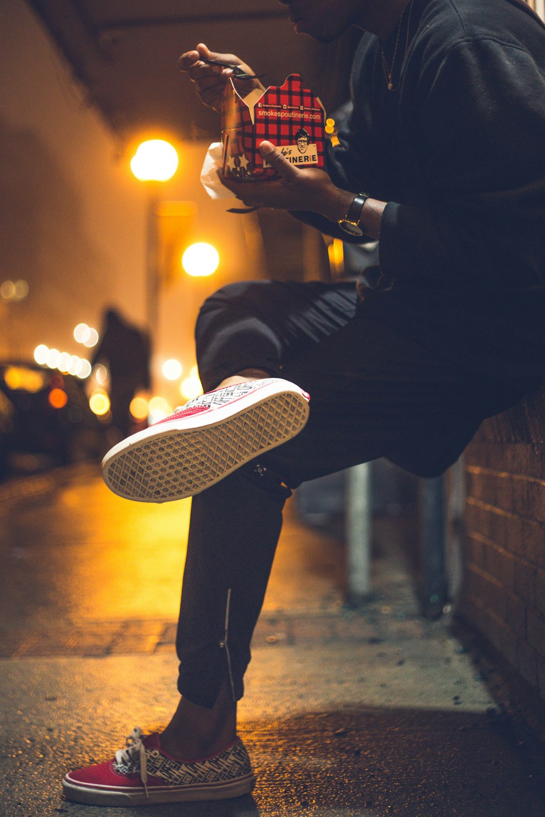 man holding red box