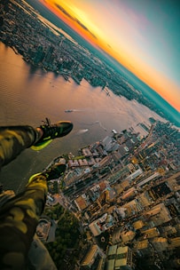 A vibrant aerial shot of a sprawling cityscape at sunset, highlighting intricate details from above.