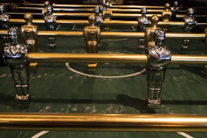 Animated foosball players clashing energetically during a match