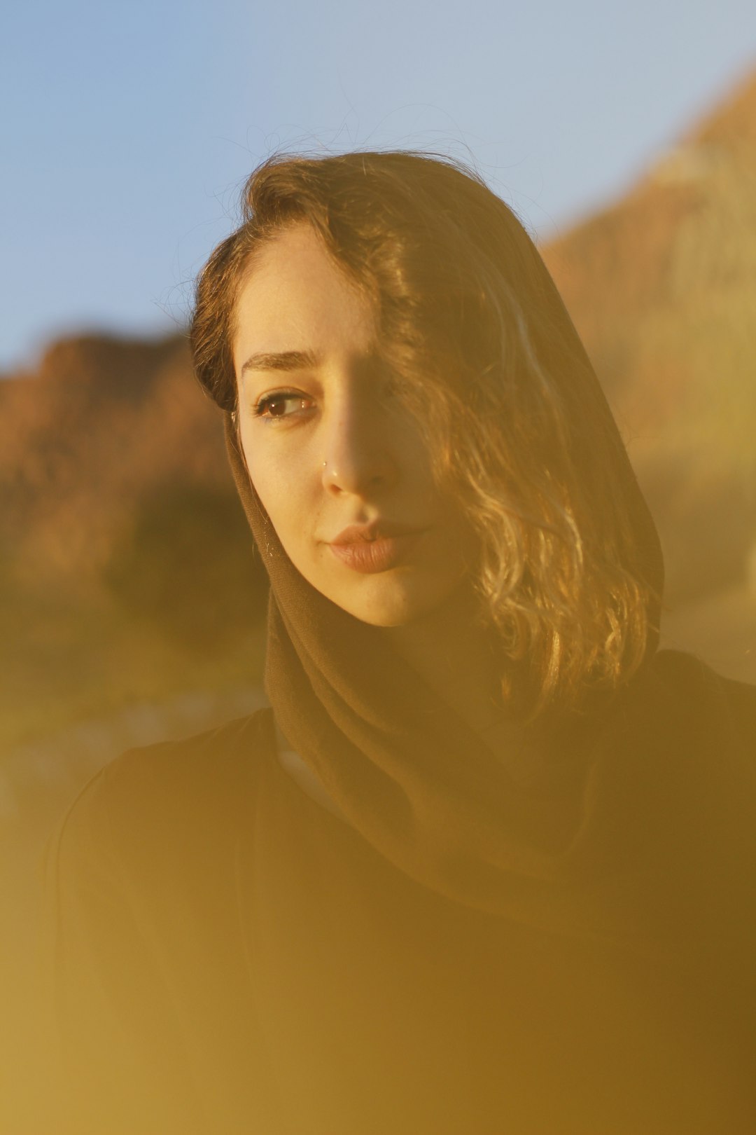 woman wears black hijab scarf