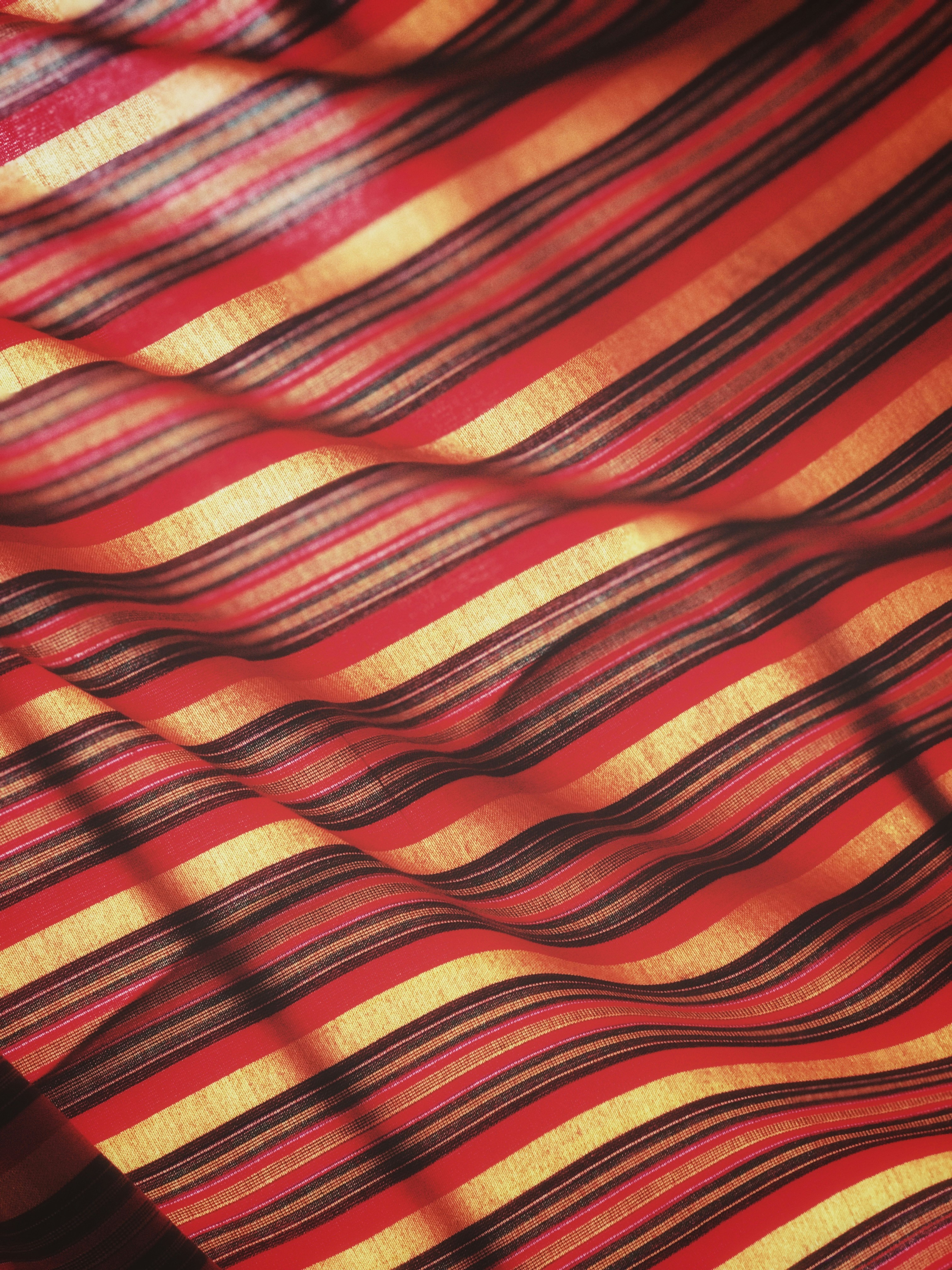 Red and yellow striped shirt photo Free Tanzania Image on Unsplash