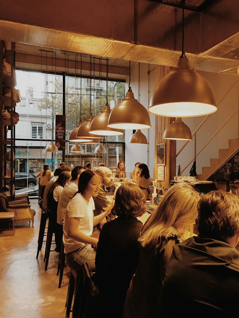 people sitting on chair inside room